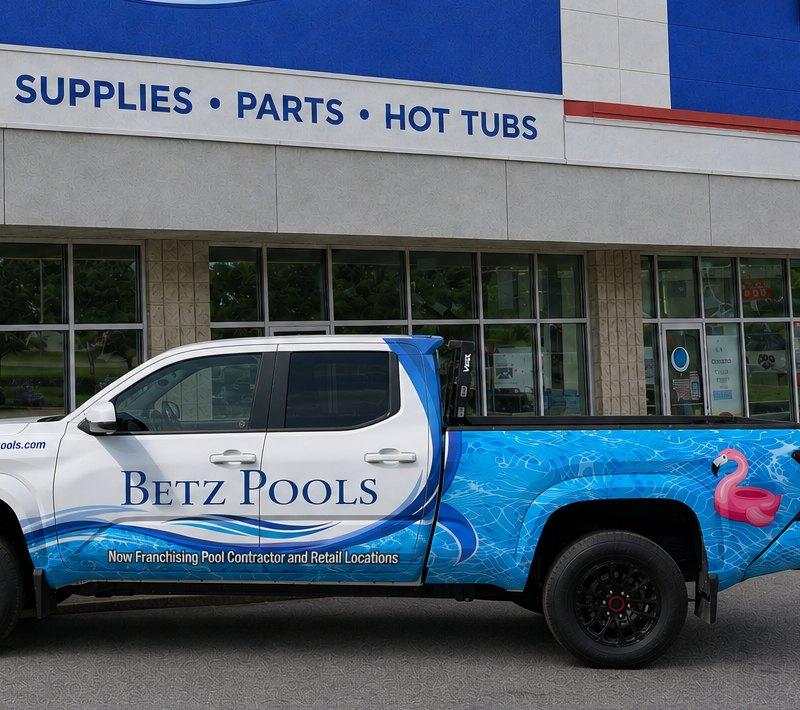 A wrapped Betz Pools service truck outside the Stouffville store